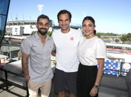 Virat Kohli and his wife Anushka Sharma with Roger Federer in Australia in 2019 (Image: Getty)